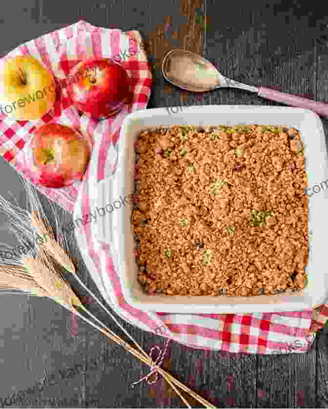 A Comforting Tray Of Homemade Apple Crumble, Featuring A Warm Apple Filling Topped With A Buttery Oat Crumble. Chocolate Chip Traybake Cookbook: Simple Recipes To Make Delicious Tray Bakes You Definitely Have To Try