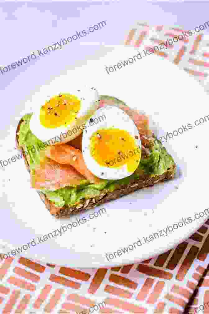 A Slice Of Avocado Toast Topped With Poached Egg, Smoked Salmon, And Microgreens The Avocado Cookbook: Fun And Easy Recipes