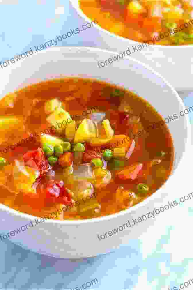 A Steaming Bowl Of Soup With Colorful Vegetables And Herbs Best Soup Recipes For All Soup Lovers: Lip Smacking Soups For You