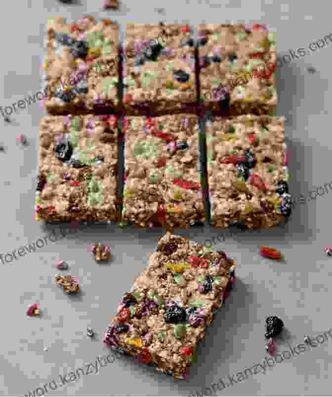 Photo Of A Variety Of Raw Vegan Snacks, Including Energy Bars, Granola, And Fruit Tarts Sweetly Raw Desserts: Raw Vegan Chocolates Cakes Cookies Ice Cream And More