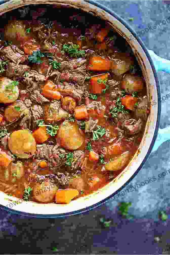 Succulent Beef Stew Cooked In A Dutch Oven On A Stovetop Outdoor Camping Cookbook: Dutch Oven Recipes The Art Of Slow Cooker And Wood Fried Grilling Cooking