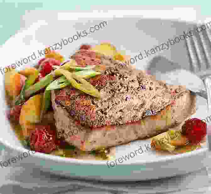 The Cover Of The Book 'The Wild Tuna Dinner,' Featuring A Photograph Of A Cooked Tuna Steak On A Bed Of Fresh Greens. The Wild Tuna Dinner: Easy Meals To Put Tuna Back On Your Dinner Plate